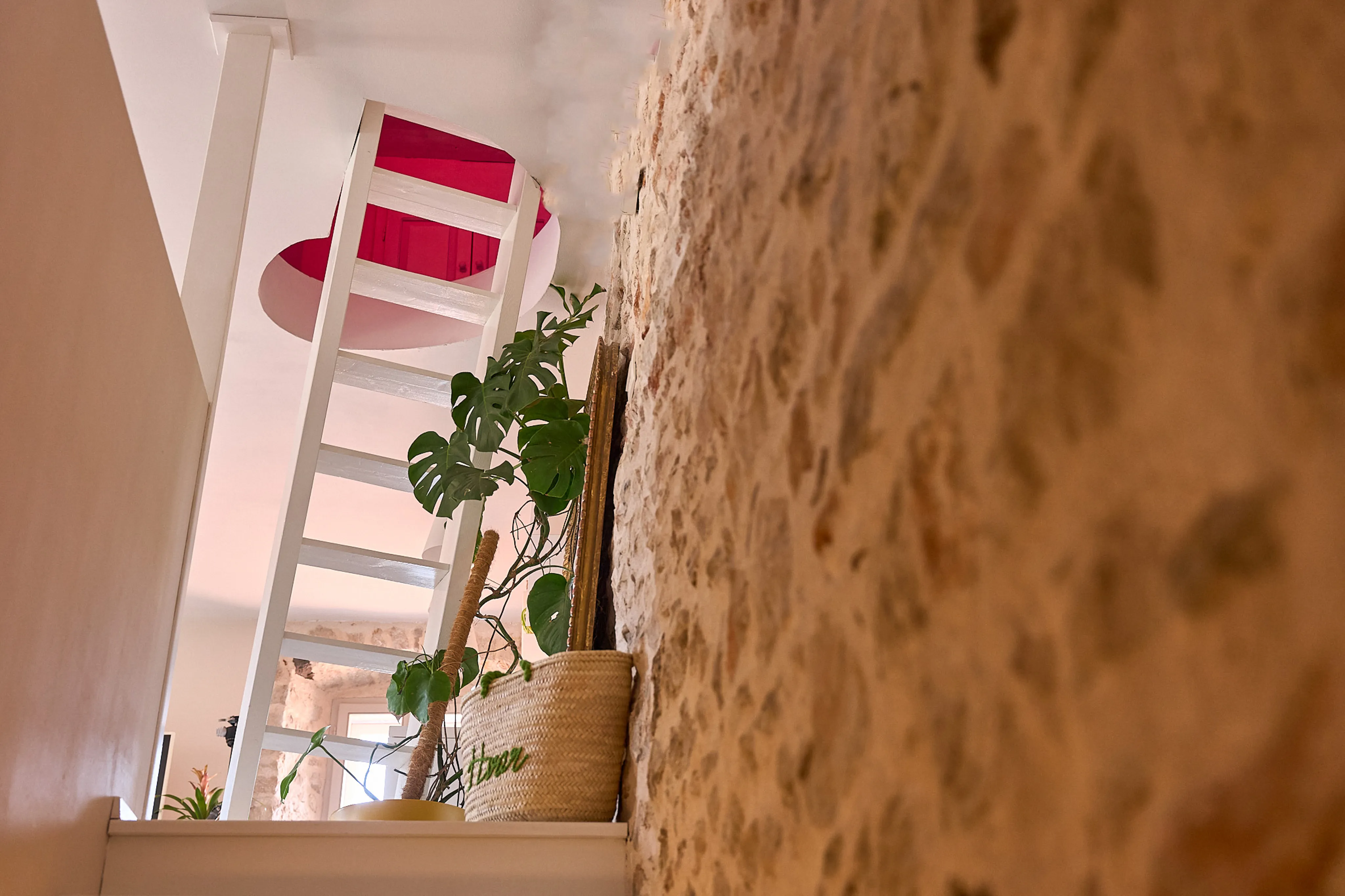Staircase and original stone wall detail in the Amanda Suite, Hidden House, Stari Grad