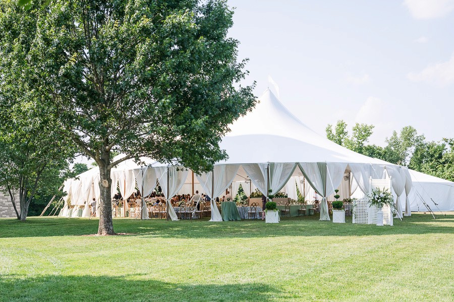 Bride and groom portrait with vintage car at the Swan House in Atlanta Georgia.