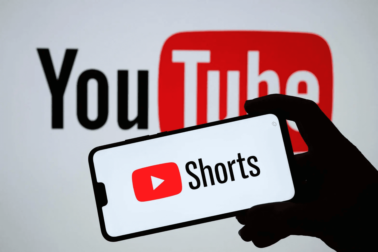 Smartphone displaying YouTube Shorts logo - YouTube Shorts Content Ideas