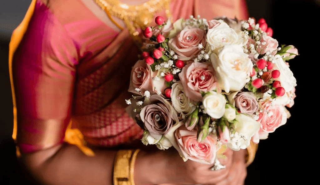 Woman with cream roses