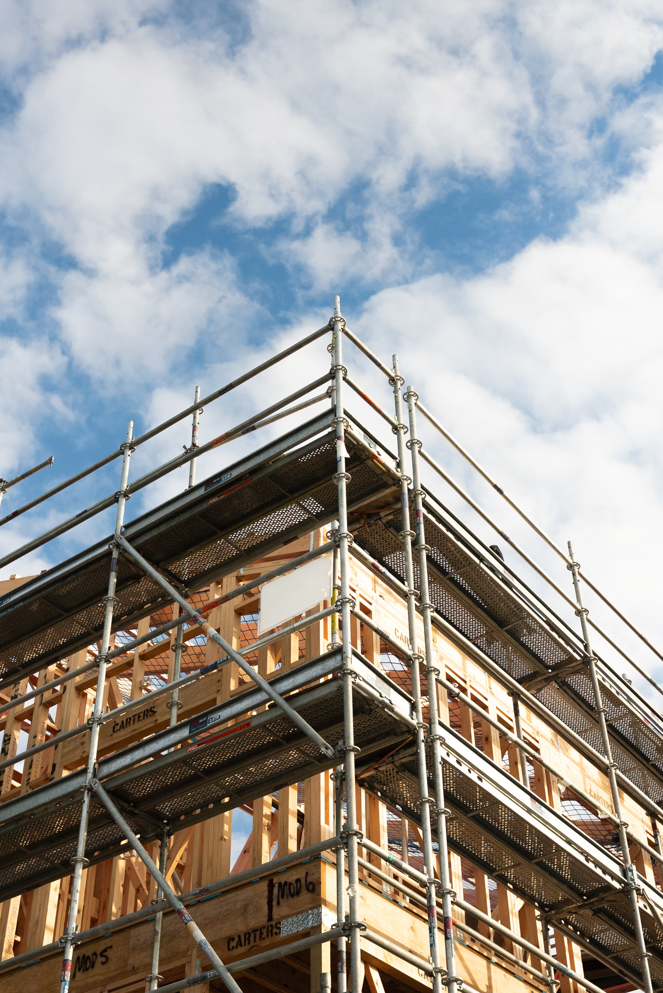 Batch.Works logo over a photo of a box of 3D printed objects