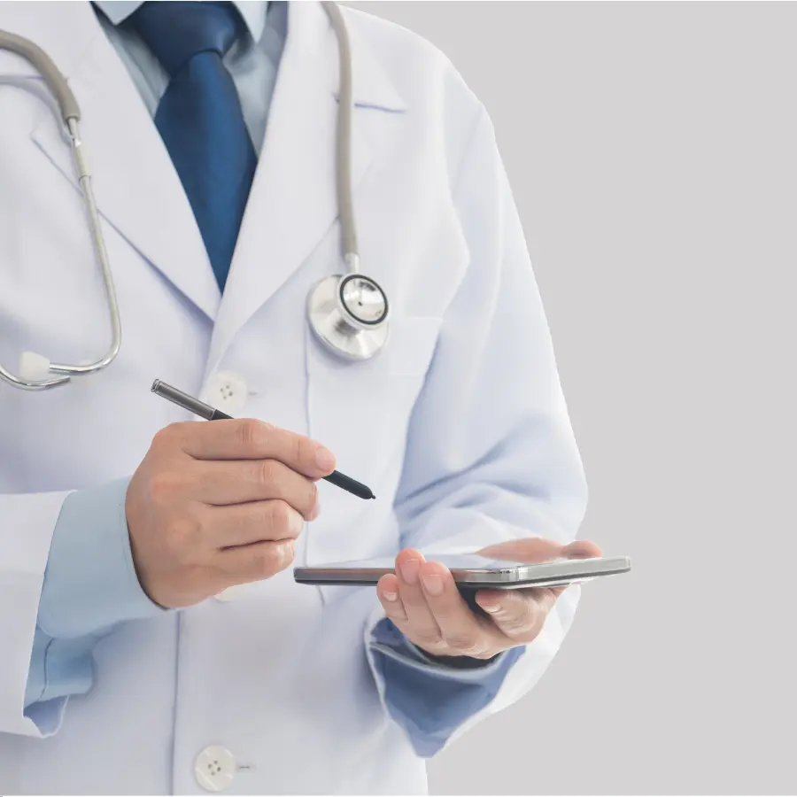 Medical dictation software enables a doctor in a white coat to record notes on a digital tablet using a stylus.