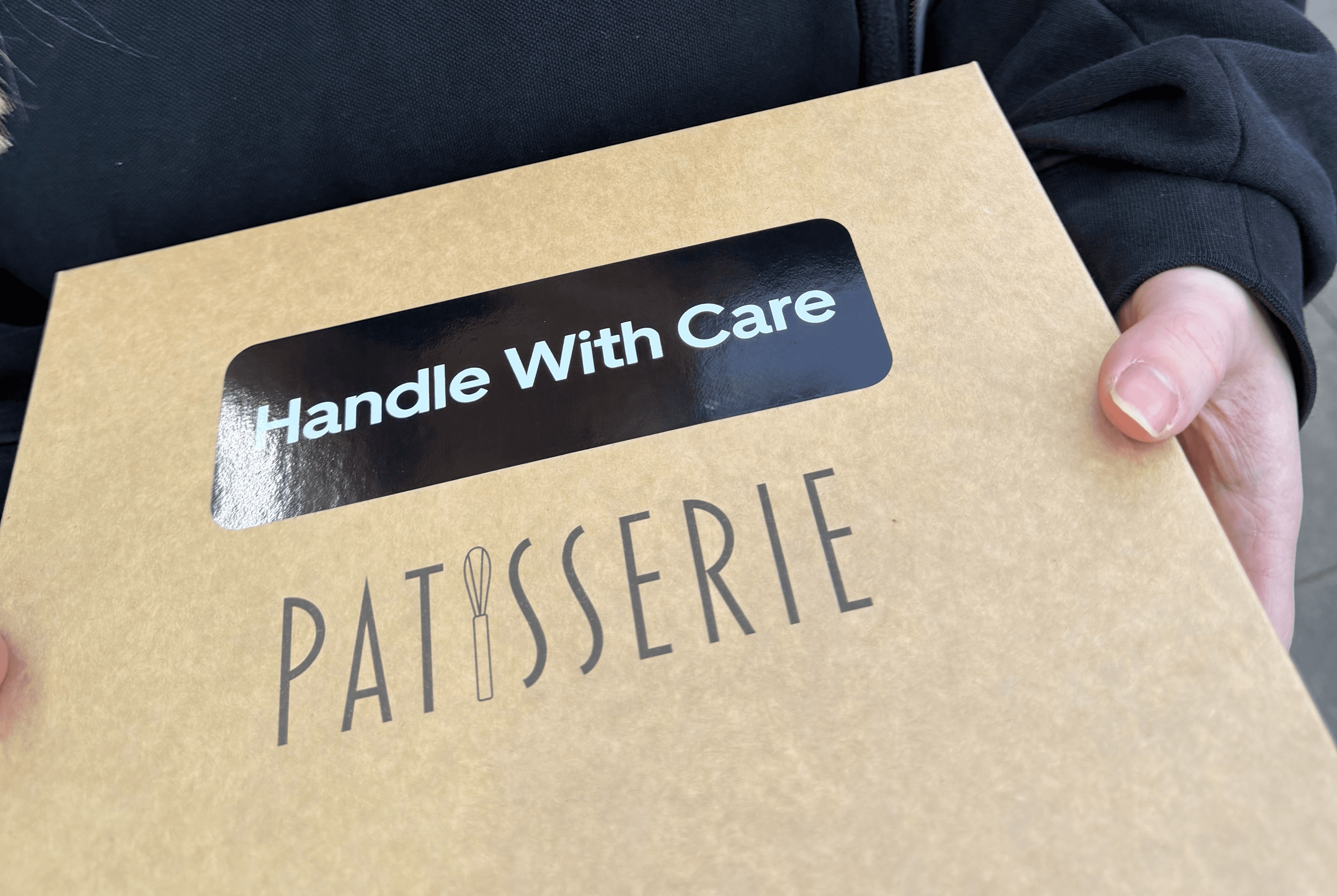 Perissology courier delivering fragile high value bakery items