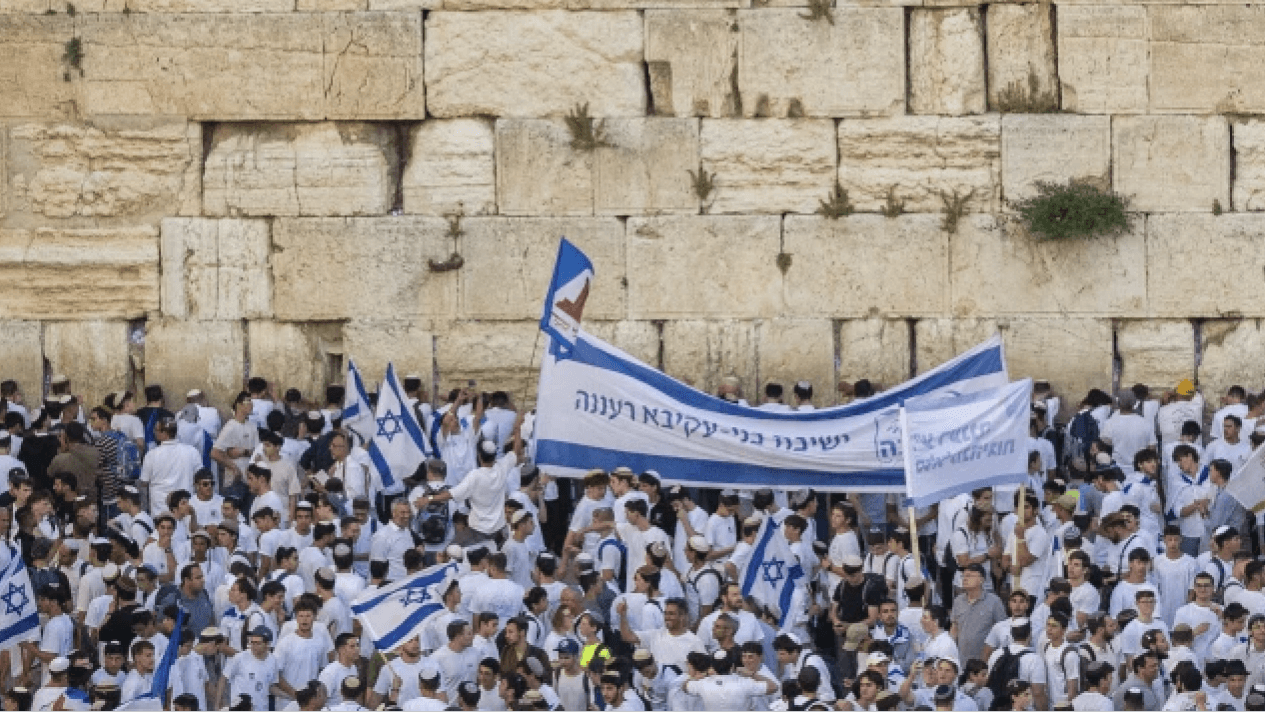 Jews celebrate Jerusalem Day at the Western Wall in the Old City of Jerusalem on the eve of Jerusalem Day, on May 14, 2026. Photo courtesy of Yonatan Sindel/Flash90.