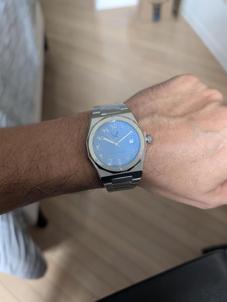 round silver-colored Rolex analog watch with link band