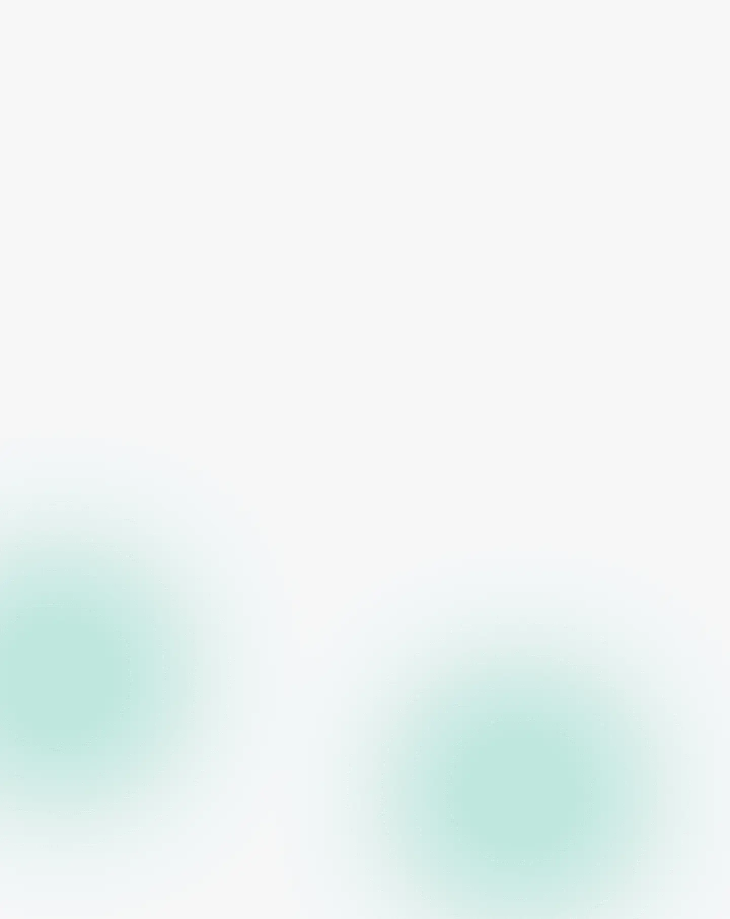 Soft green bokeh circles on white background