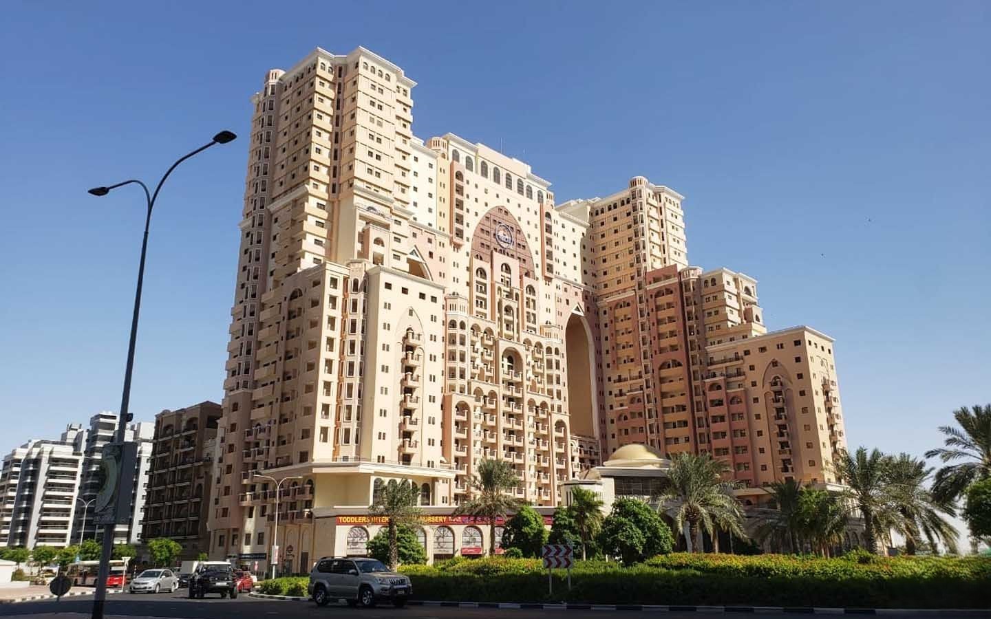 Lush courtyard view of Silicon Gates in Dubai, a prime location curated by our real estate experts.