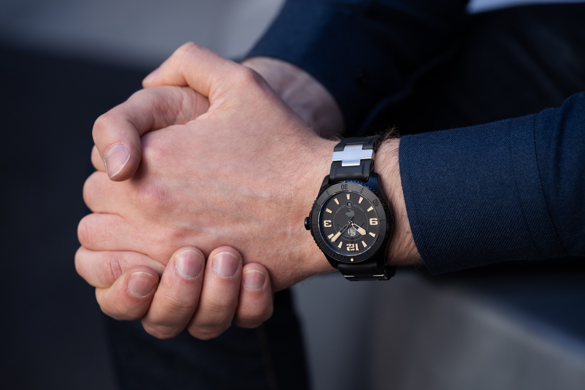 Black mens watch on a write lifestyle product photography