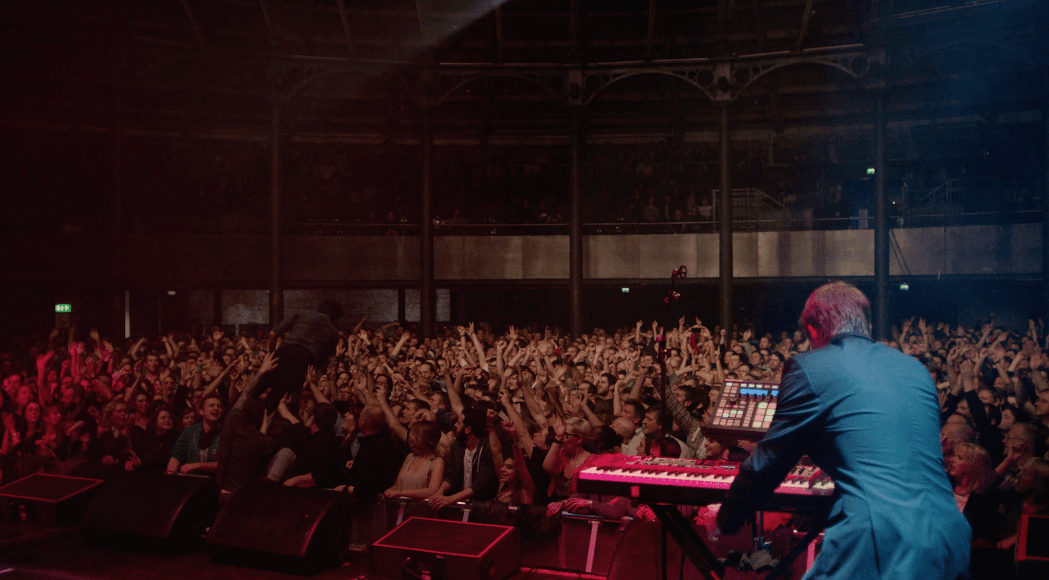 Streetside billboard with flyposters of the Batch.Works brand and illustrations