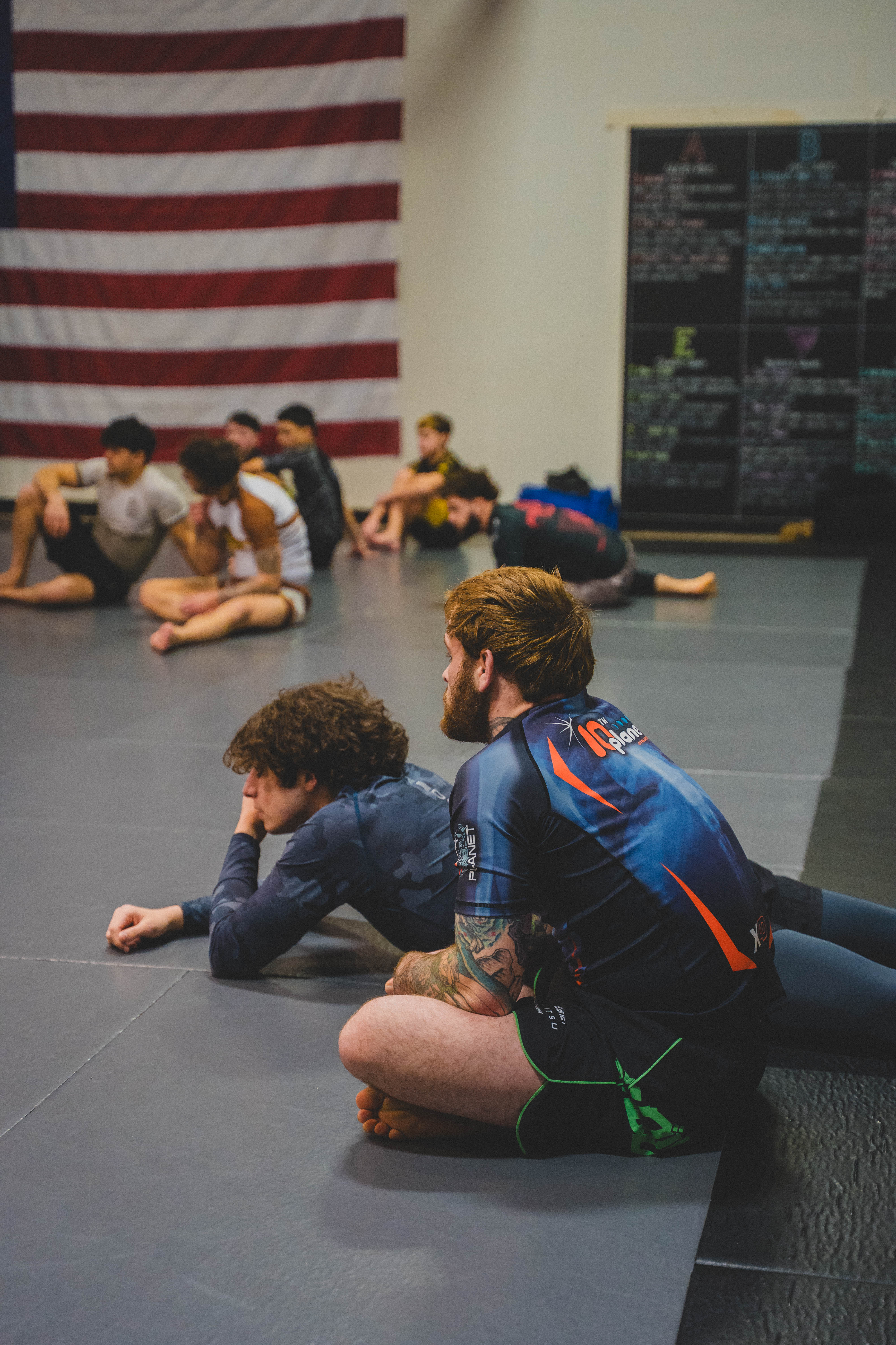 laptop on desk with an imac on