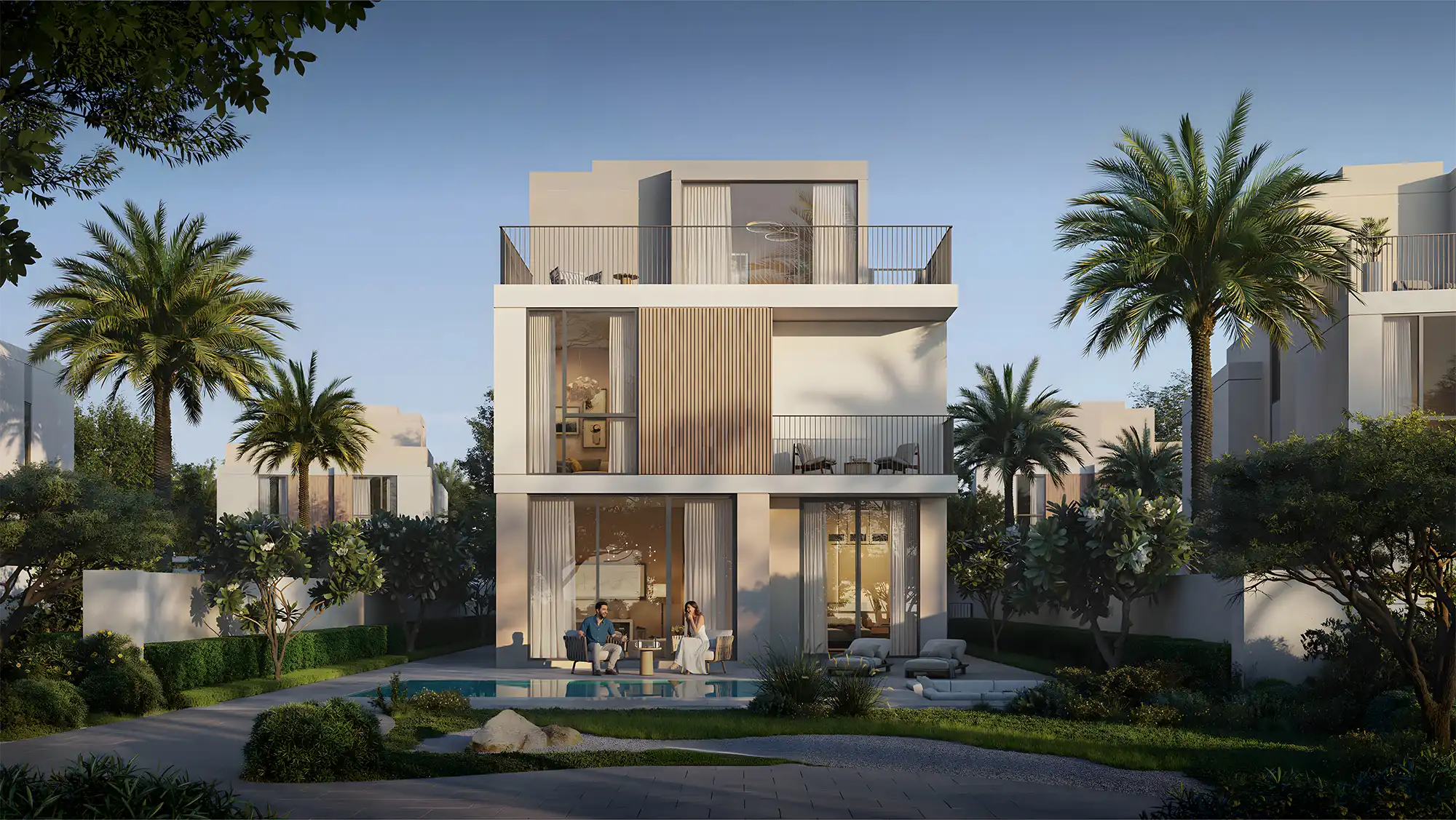 A modern villa featuring a pool surrounded by palm trees, showcasing a luxurious outdoor living space.