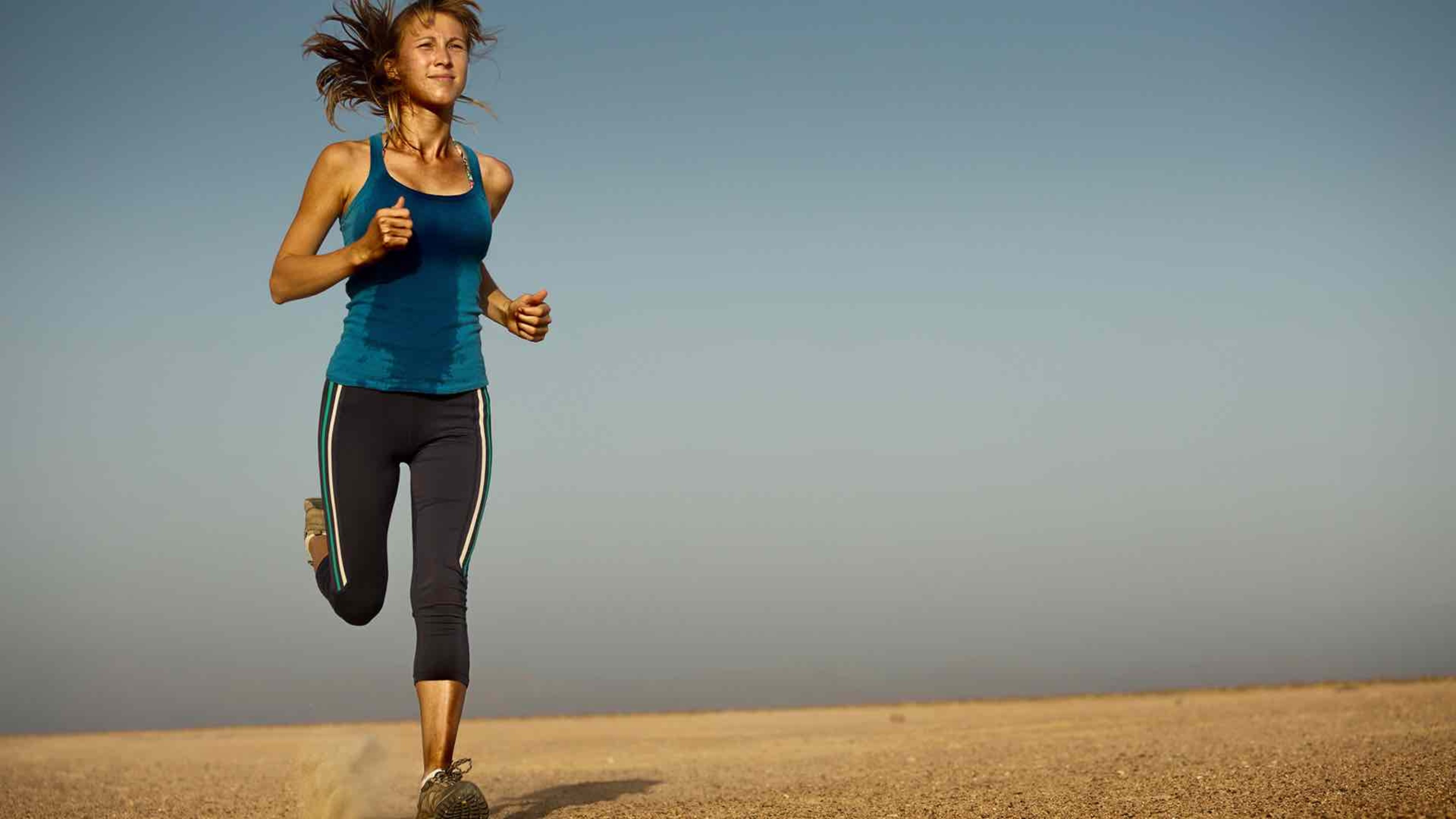 woman running on a field