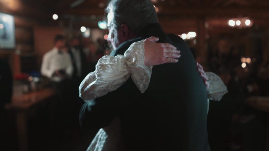 First dance at Pine Creek Cookhouse reception Ashcroft Colorado winter wedding inside log cabin restaurant