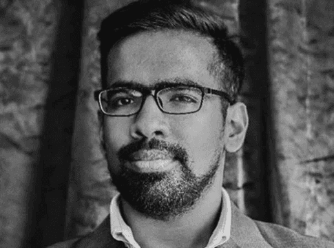 Black-and-white portrait of Trustethica founder Vivegavalen Vadi Valu.