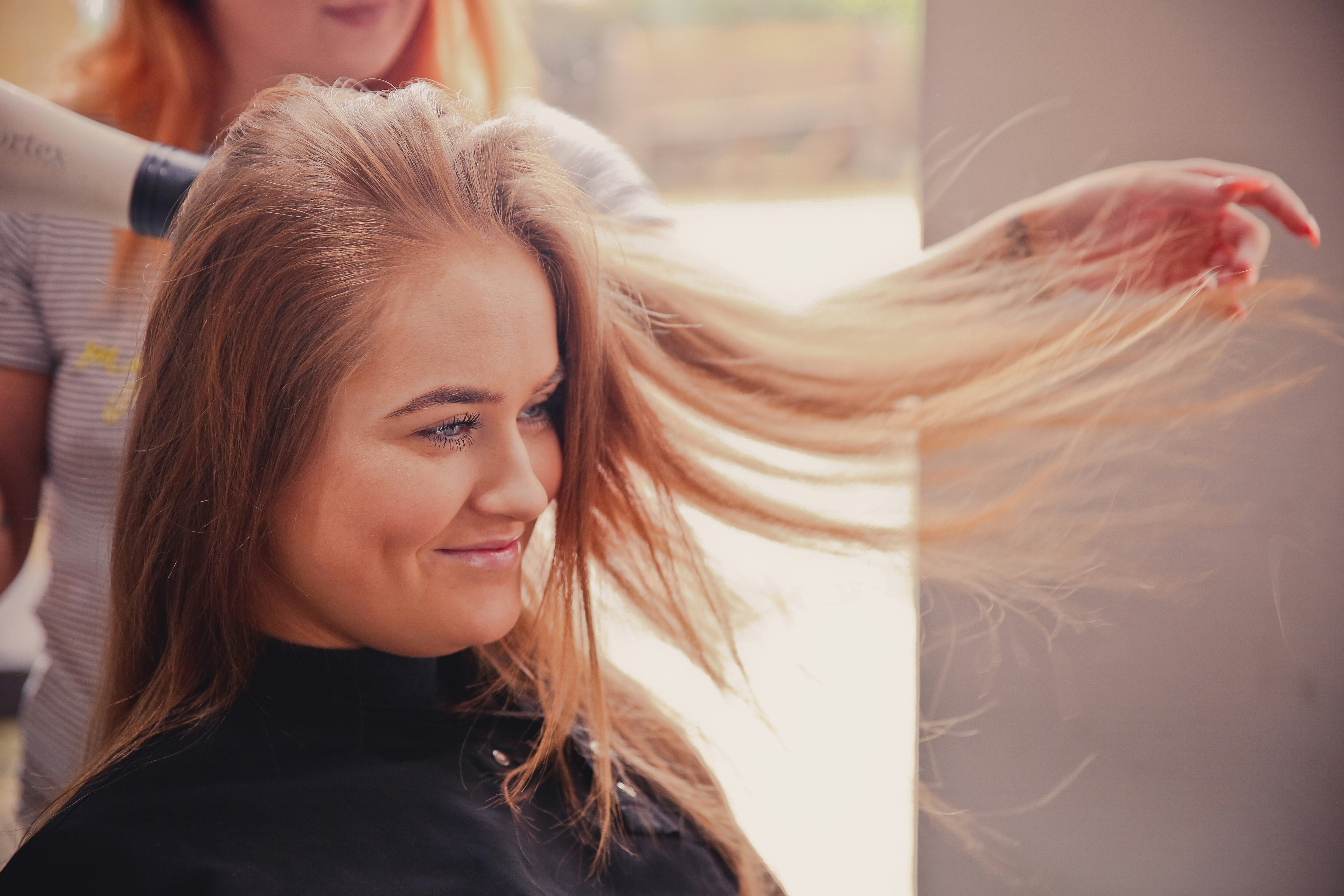 woman with styled hair - Color Analysis Cost