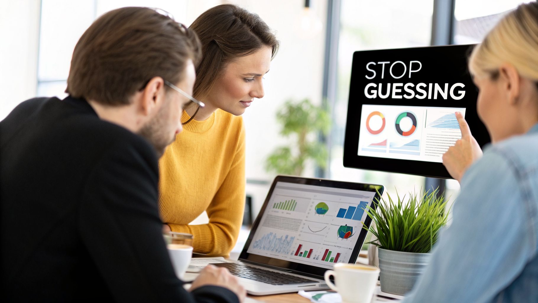 Three business people analyzing data and charts on a laptop and monitor, with 'STOP GUESSING' displayed.