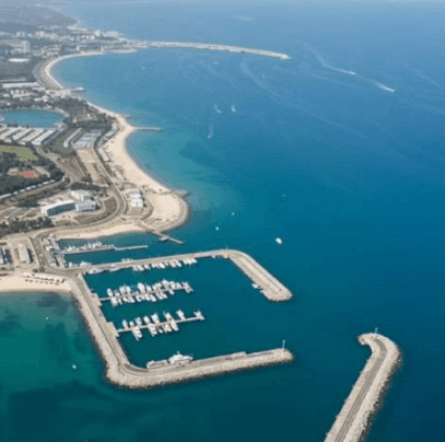two men in suit sitting on sofa