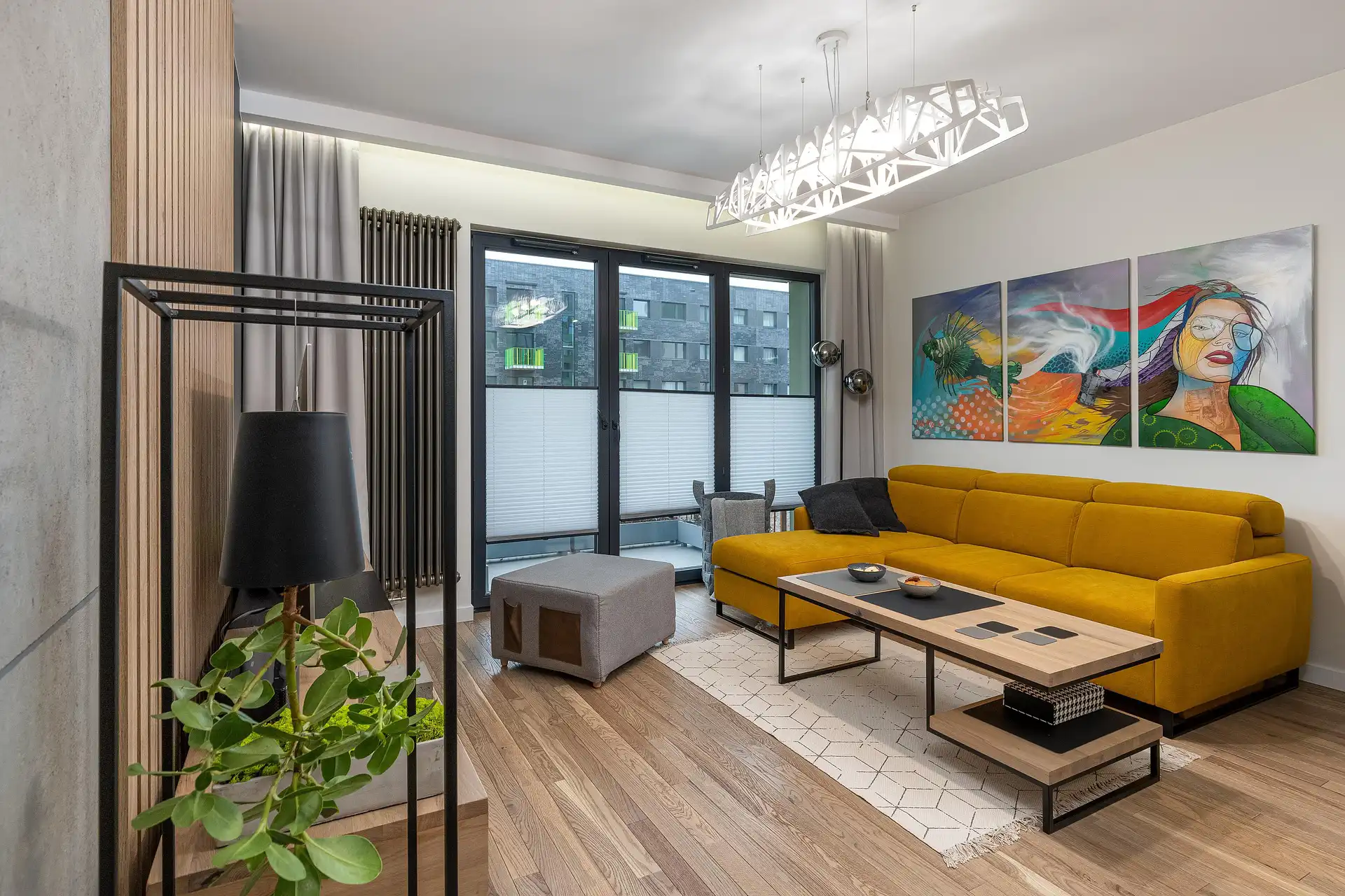 Spacious lounge with seating arrangement and decorative accents