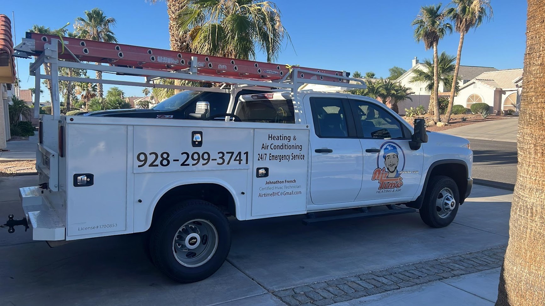 One of Air Time's trucks park outside a house
