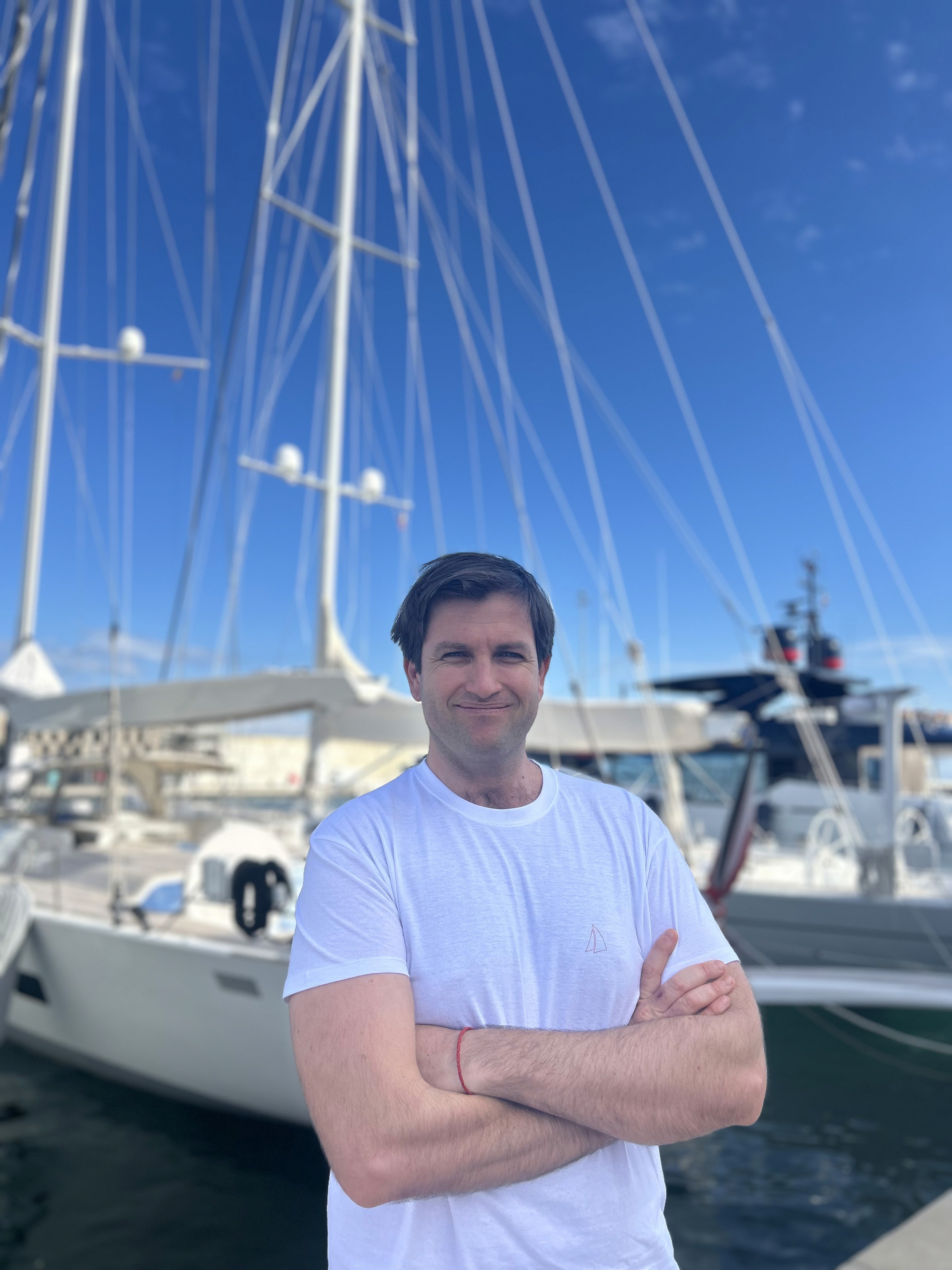 man standing beside wall