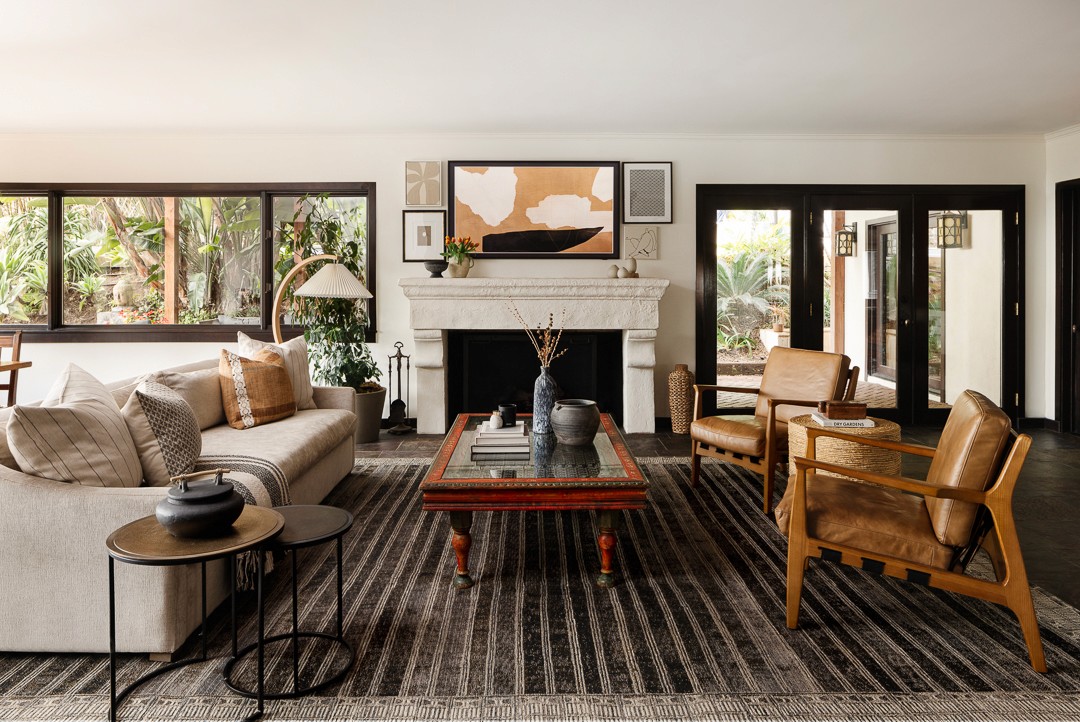A Modern and inviting contemporary living room design featuring warm earth tones and natural textures