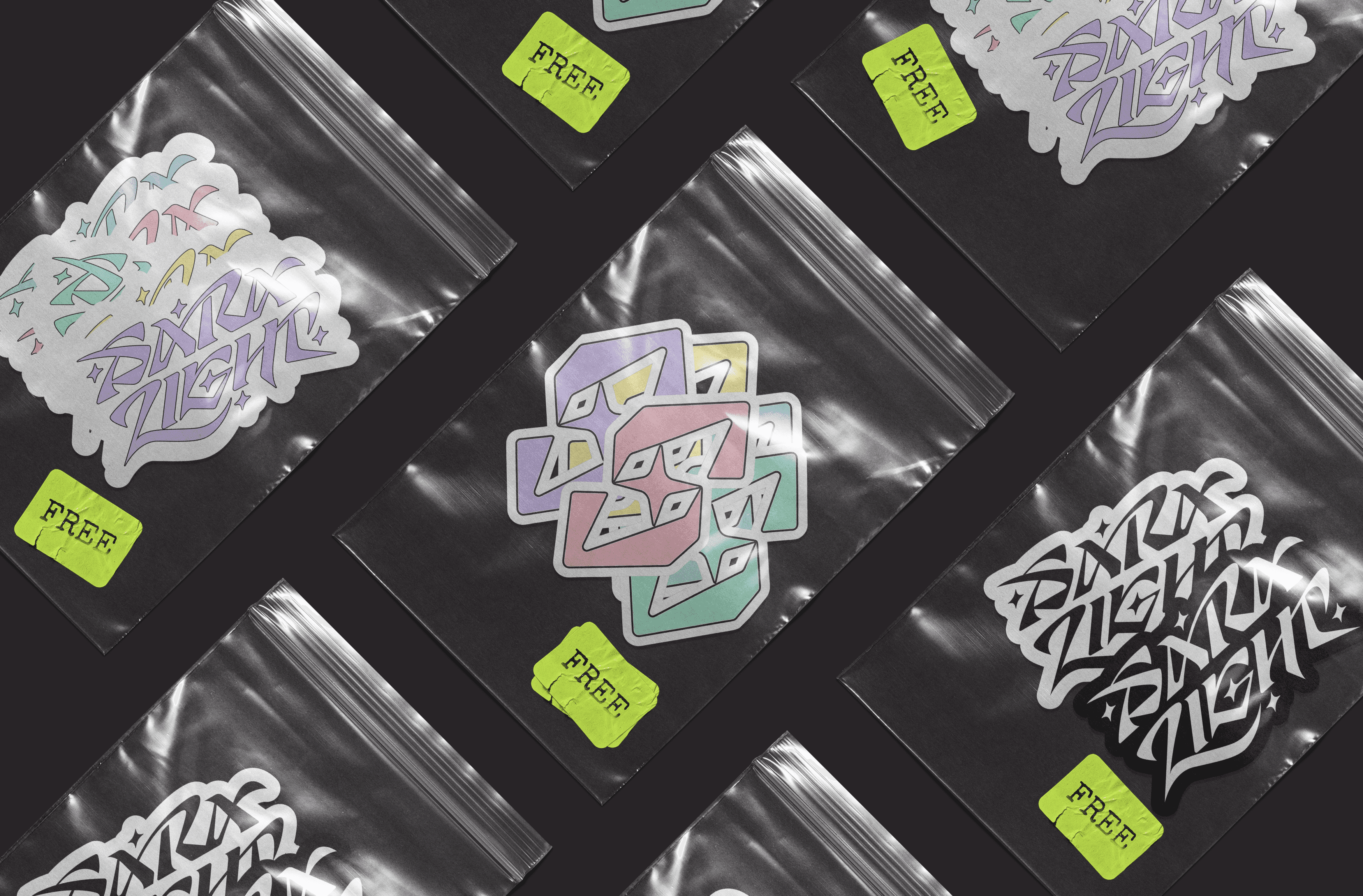 flatlay with pastel coloured stickers inside individual sealable bags with Sara Light's logo