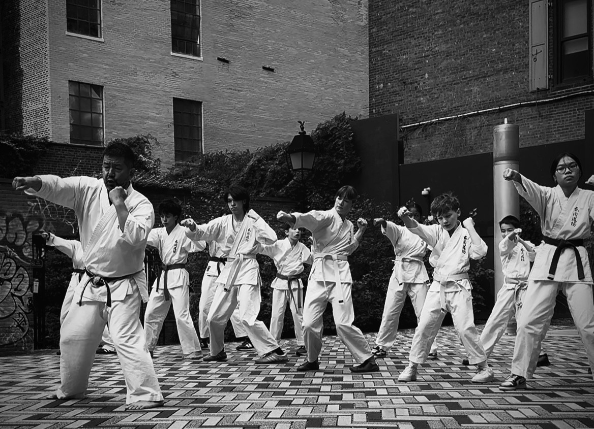 a black and white living room with a large tv