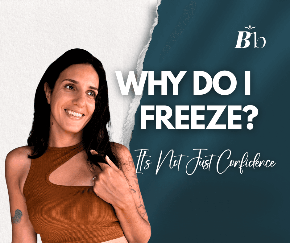 A woman is standing, smiling, staring at the top right corner, She is playing with her hair in a slightly tense mode. The caption reads "Why do I freeze? It's not just confidence"