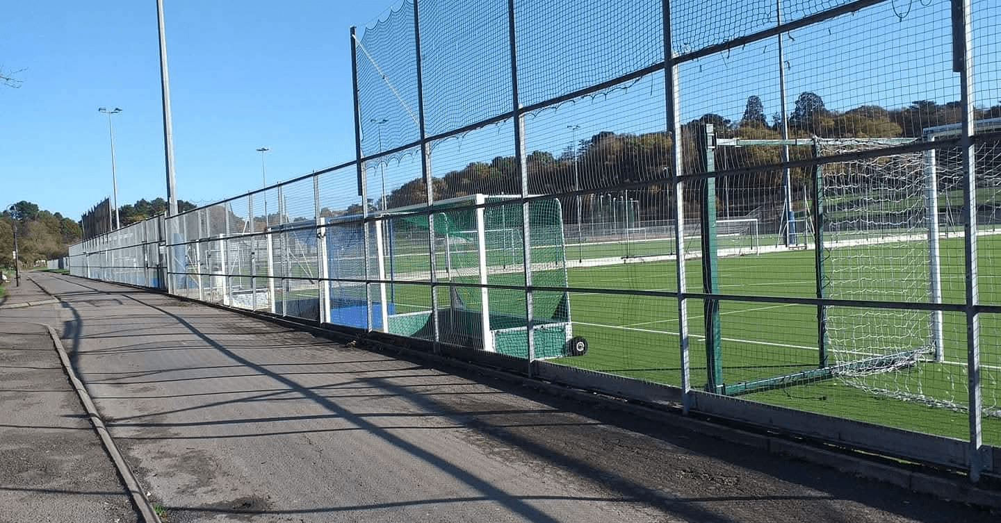 Drone shot of a running track at night