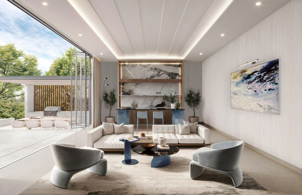 The living room and kitchen of Windsor House II, designed with a sleek, modern aesthetic and open space concept.
