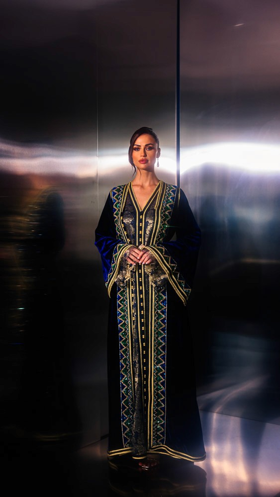 Deepsea Blue Moroccan caftan with gold and green embroidery, handcrafted couture design inspired by traditional Moroccan artistry