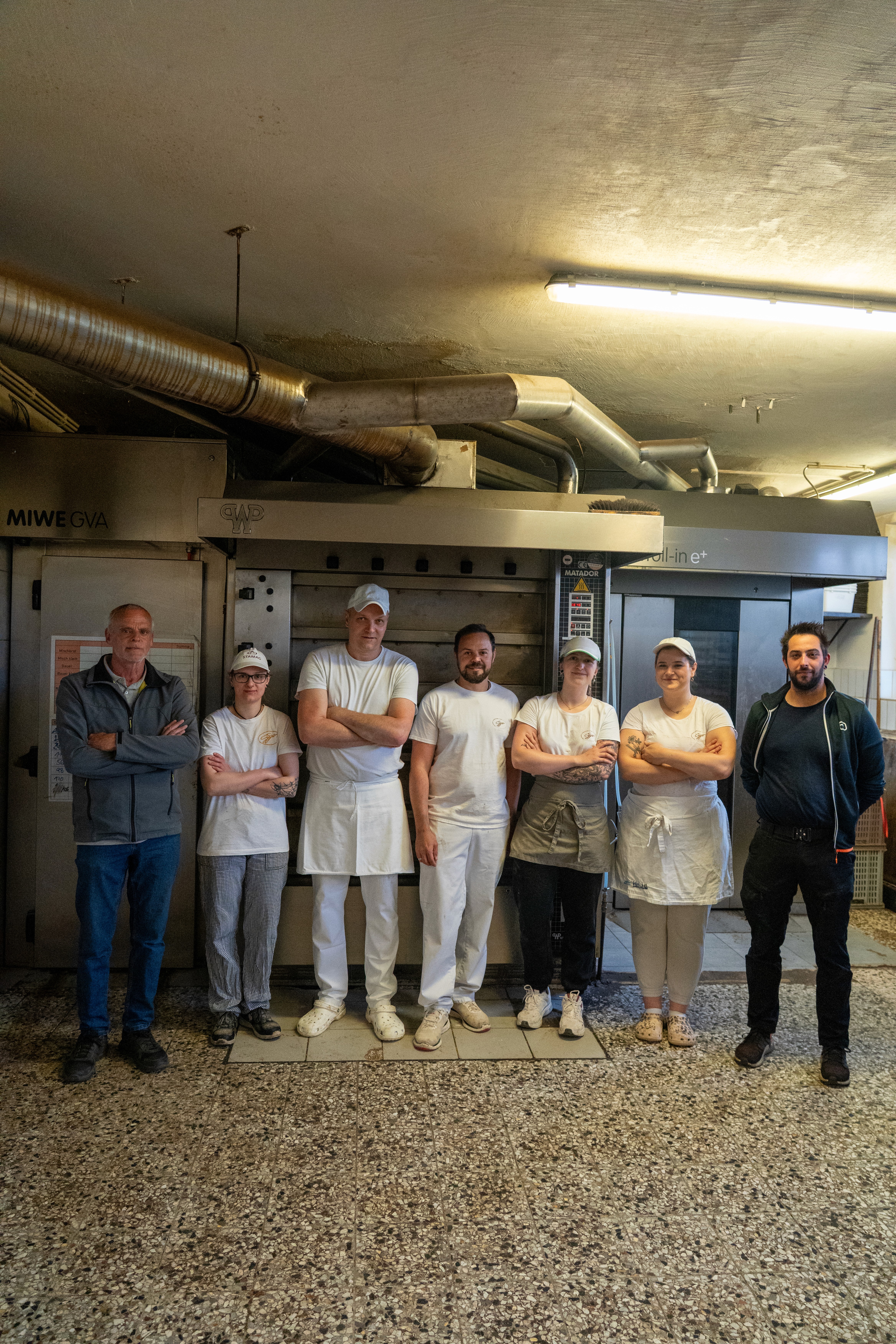 Chefs working in a busy restaurant kitchen