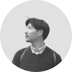 a woman standing in the woods with her hands on her hips