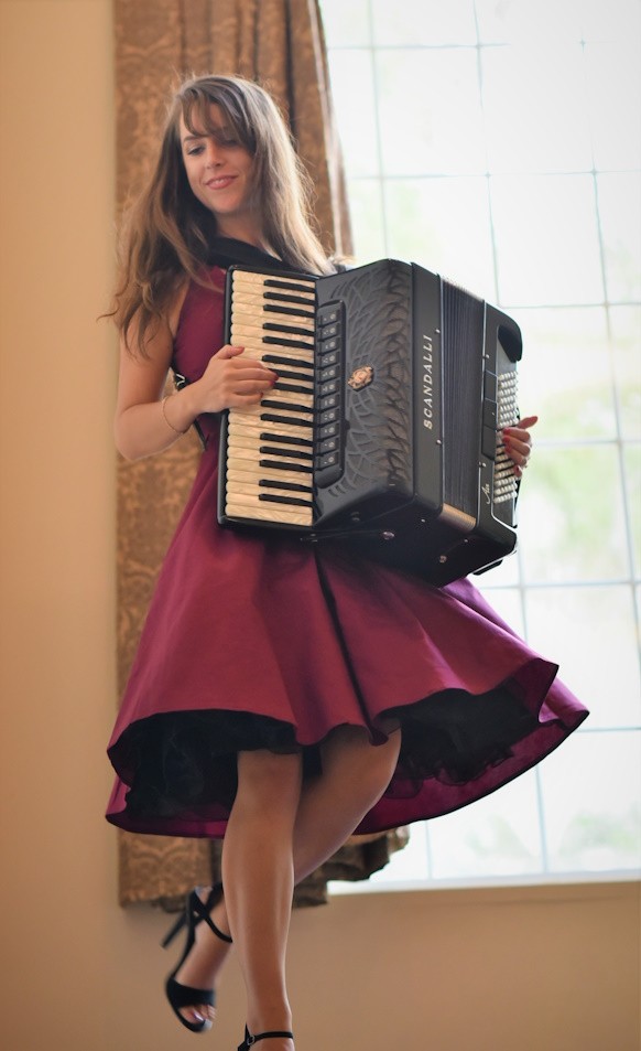 Lucy performing at a corporate event