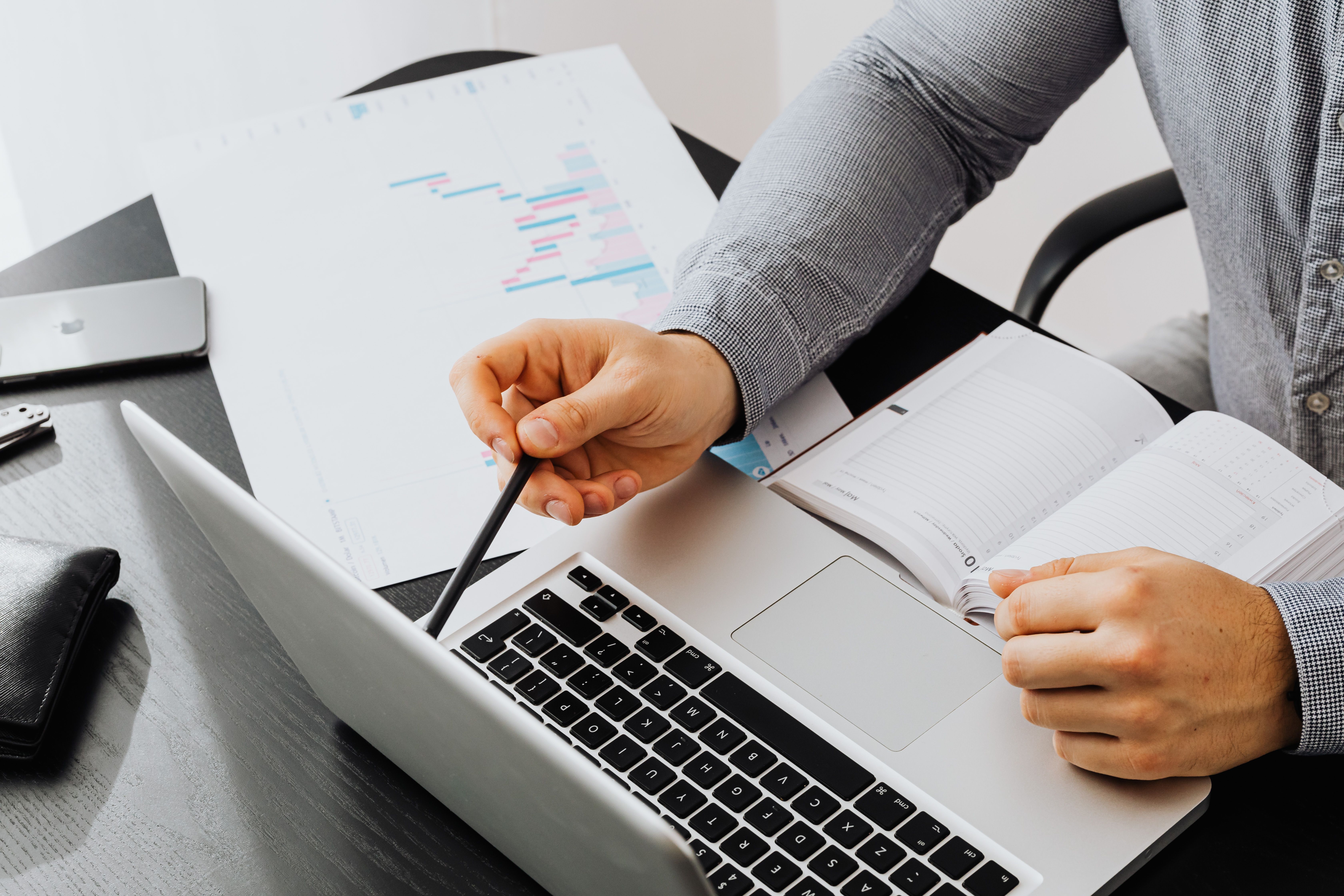 Accountant verifying tax documents and correcting invoice with reverse charge for EU client, fixing missing art. 317 code and filing D390 with ANAF Romania