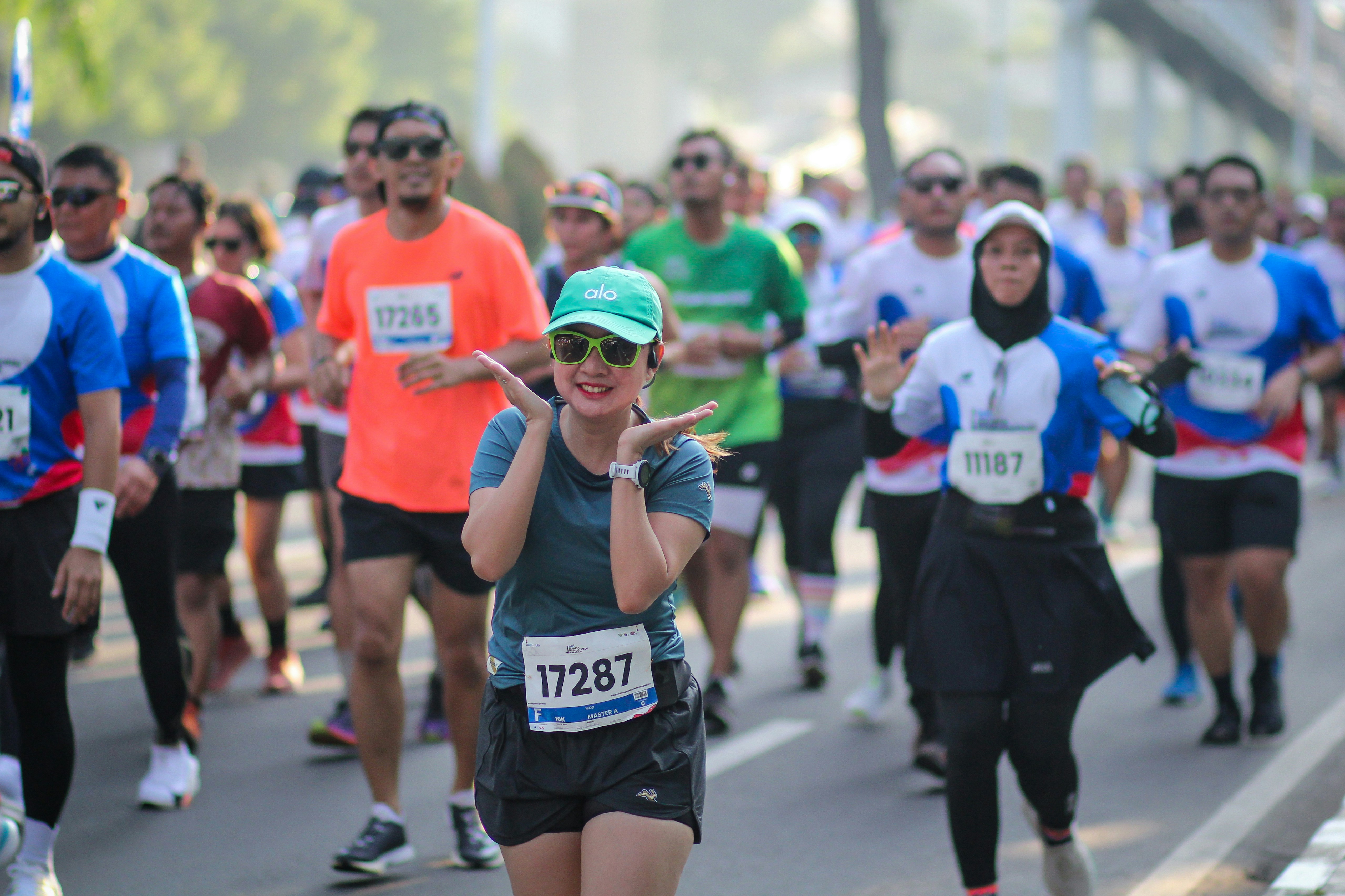 A group of people running in a marathon