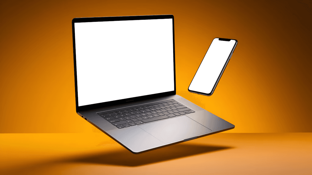 person holding pencil near laptop computer