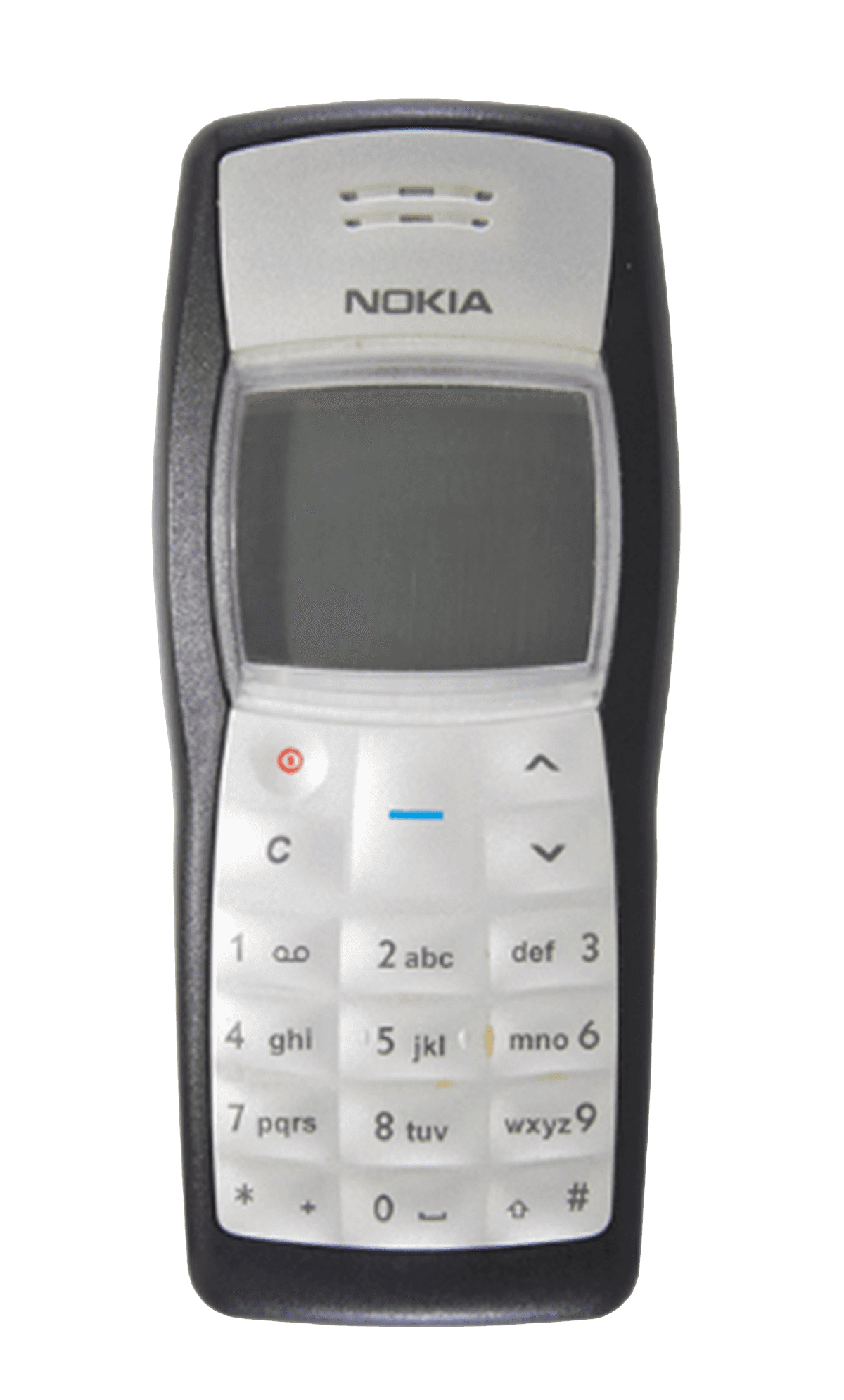 A close-up of a hand wearing multiple decorative rings against a blue background.