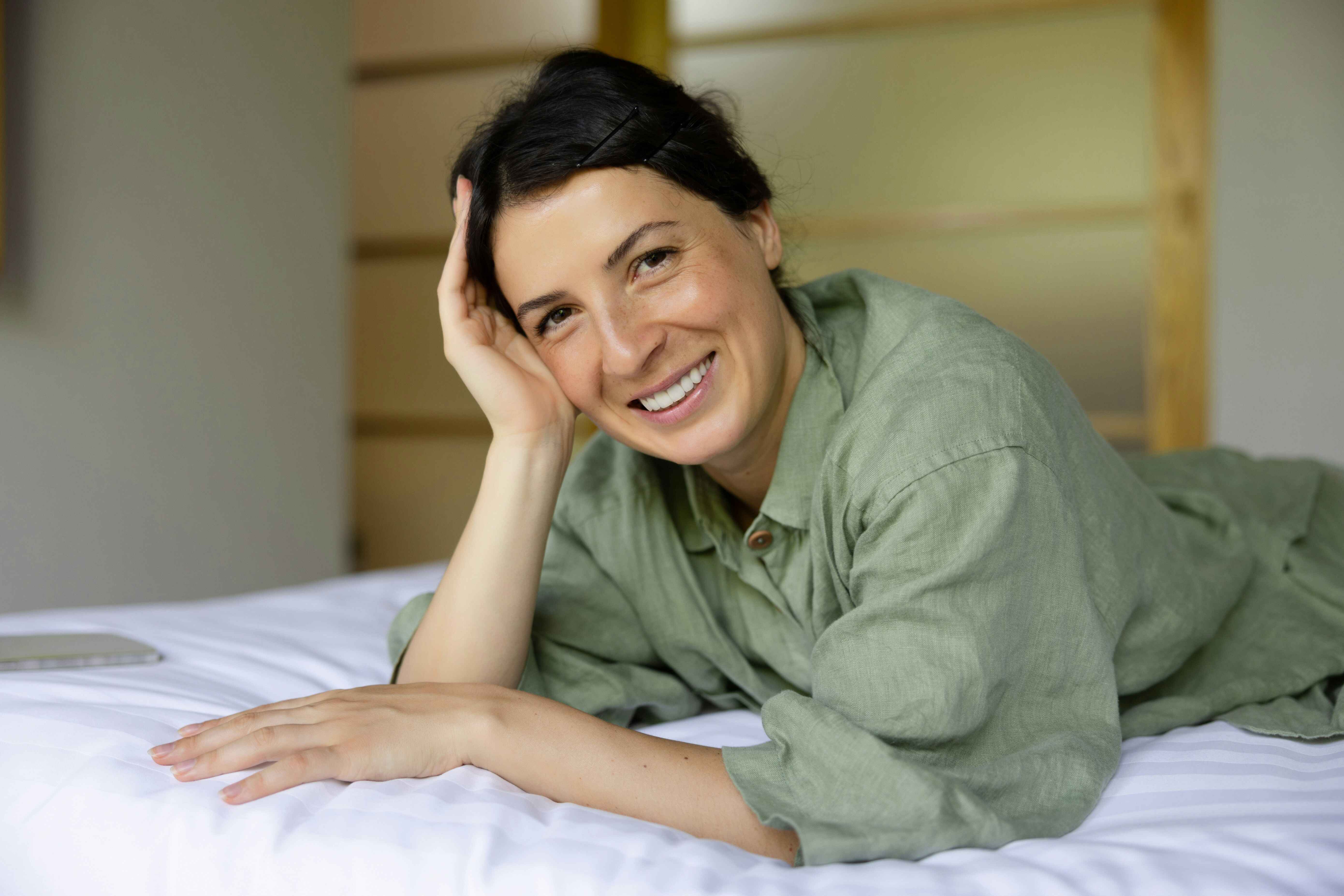 Middle-aged woman feeling empowered and confident during menopause with therapeutic support