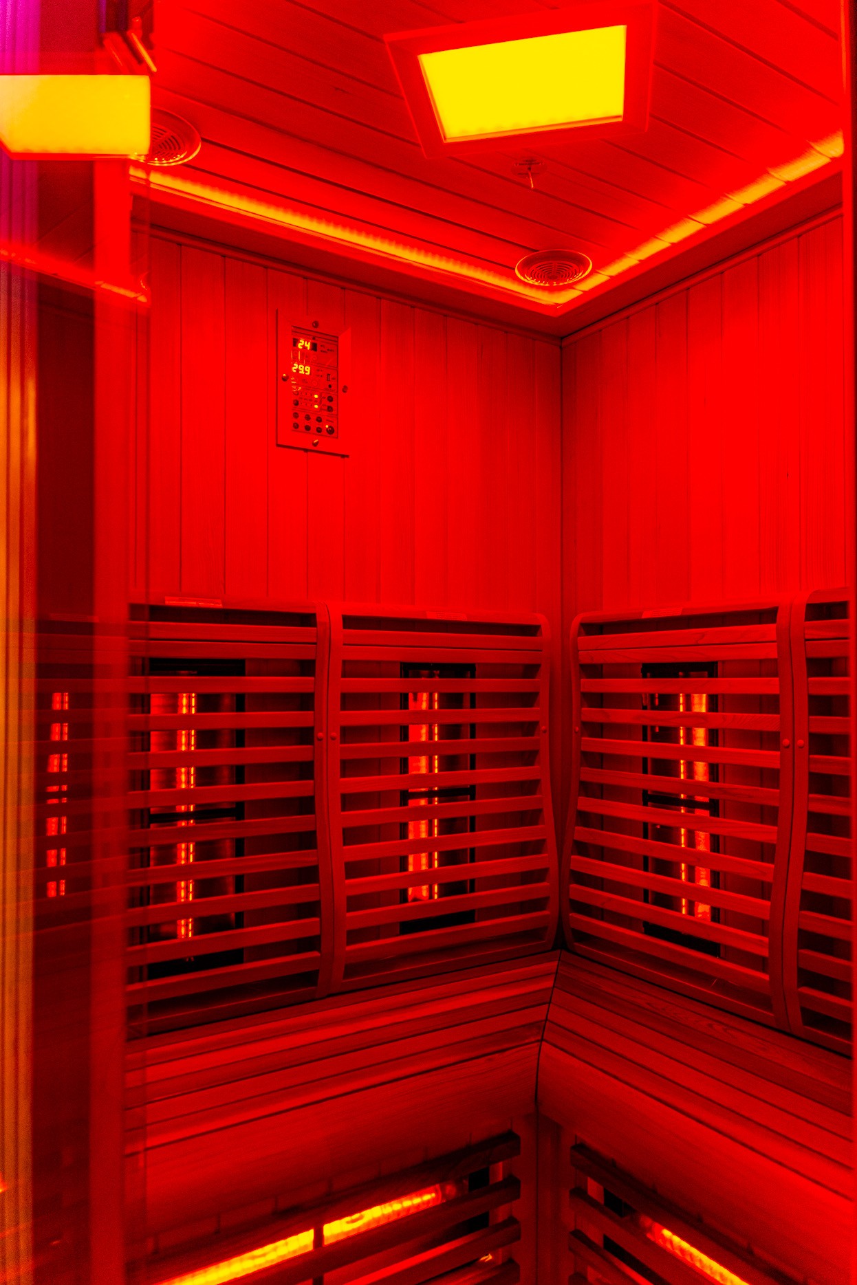 Tower emerging from clouds at sunset