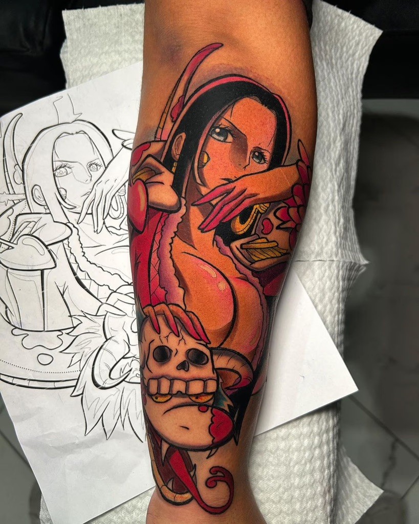 A tattoo of Boa Hancock by Pedro Aguilar, depicting her in her full pirate empress glory with her iconic snake, Salome, wrapped around her