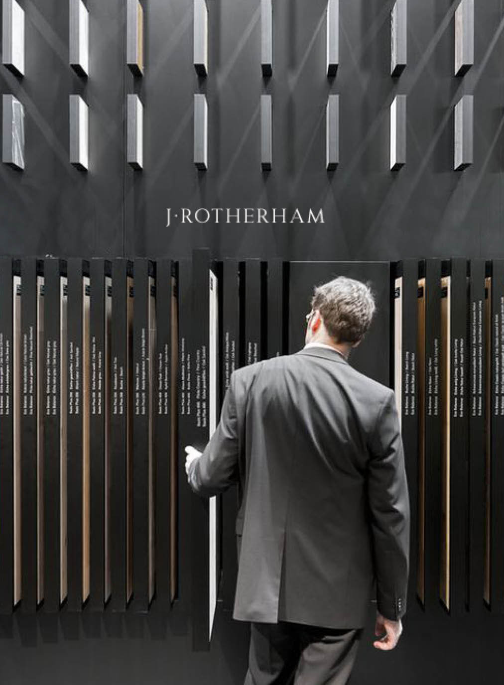 Luxury brand campaign photography featuring an individual interacting with a bespoke architectural installation, highlighting premium storytelling, craftsmanship and brand experience design