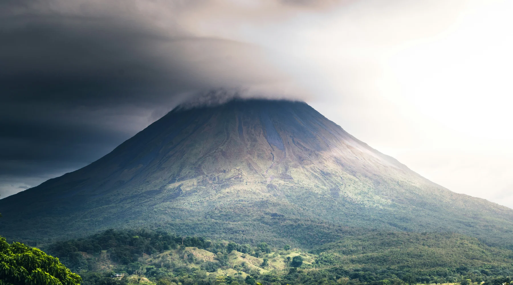 Arenal Volcano hidden behind clouds