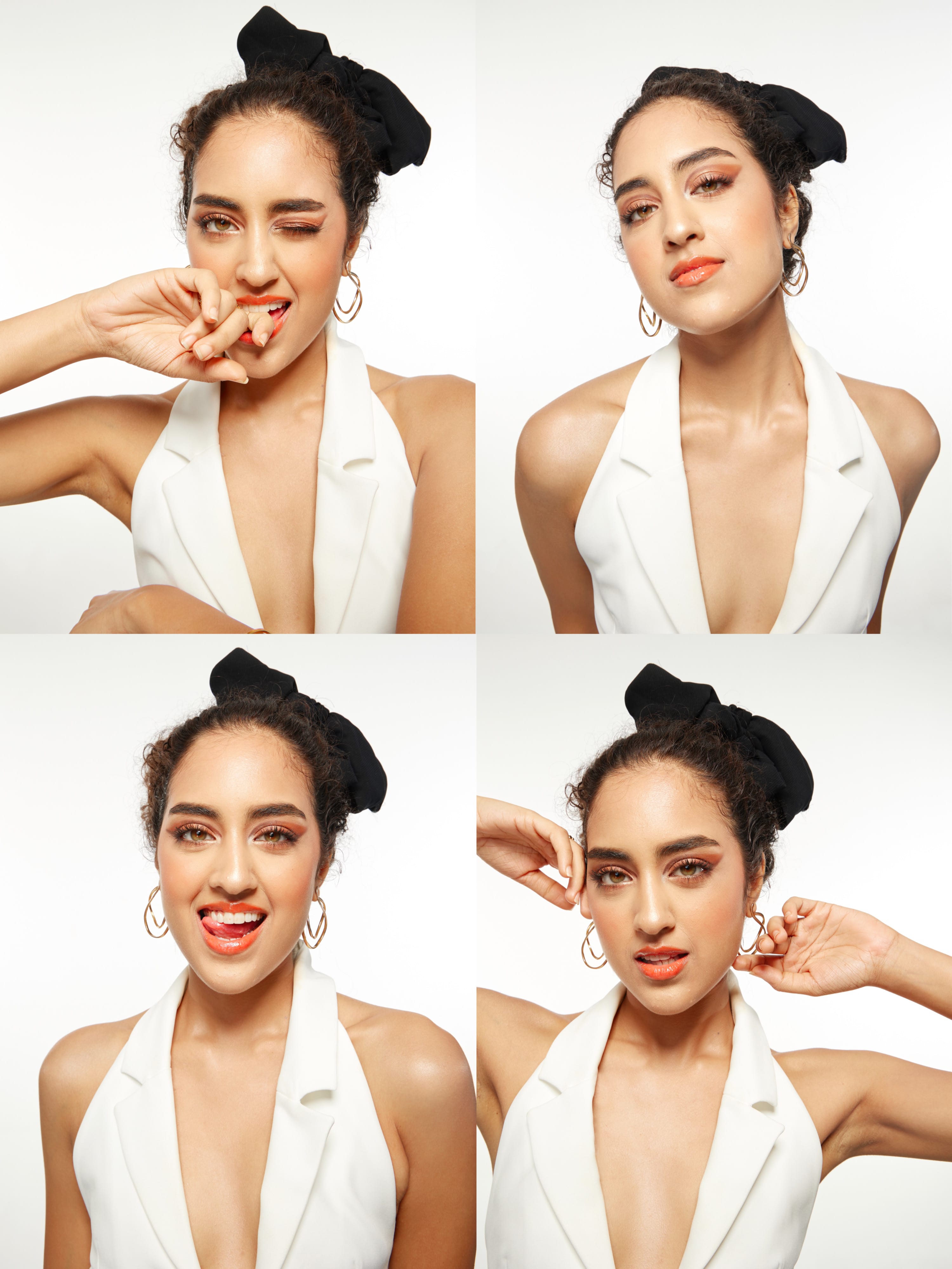 Group of friends smiling on a lively city street at night