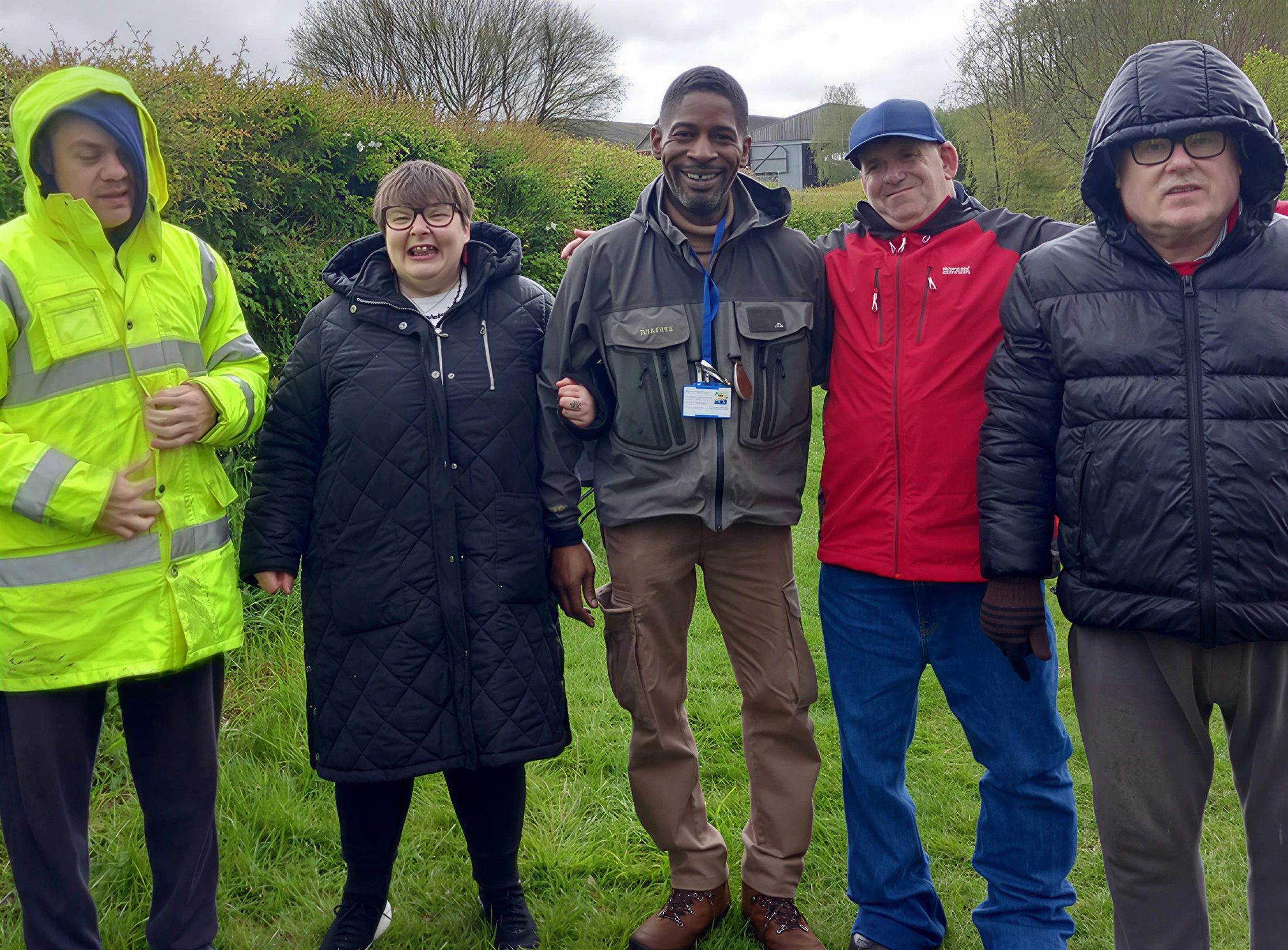a group of children sitting on steps in front of a building