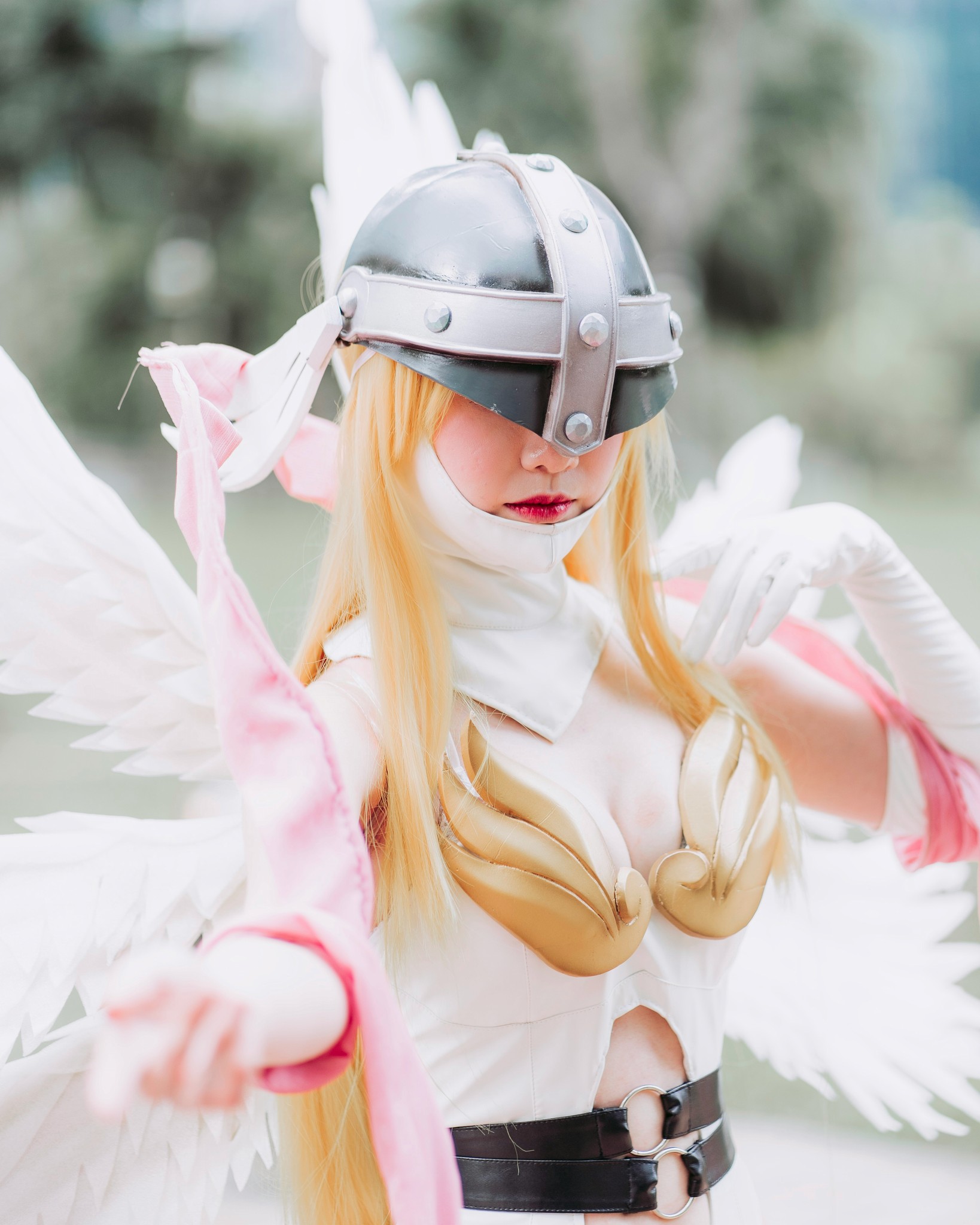 A photo showing a Digimon cosplayer. Photo by Muhammad Faiz Zulkeflee on Unsplash.