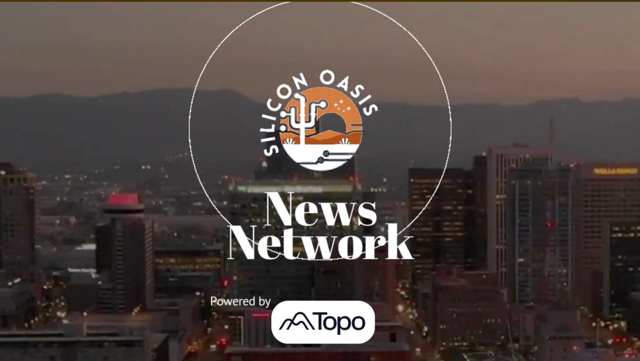 a black and white living room with a large tv