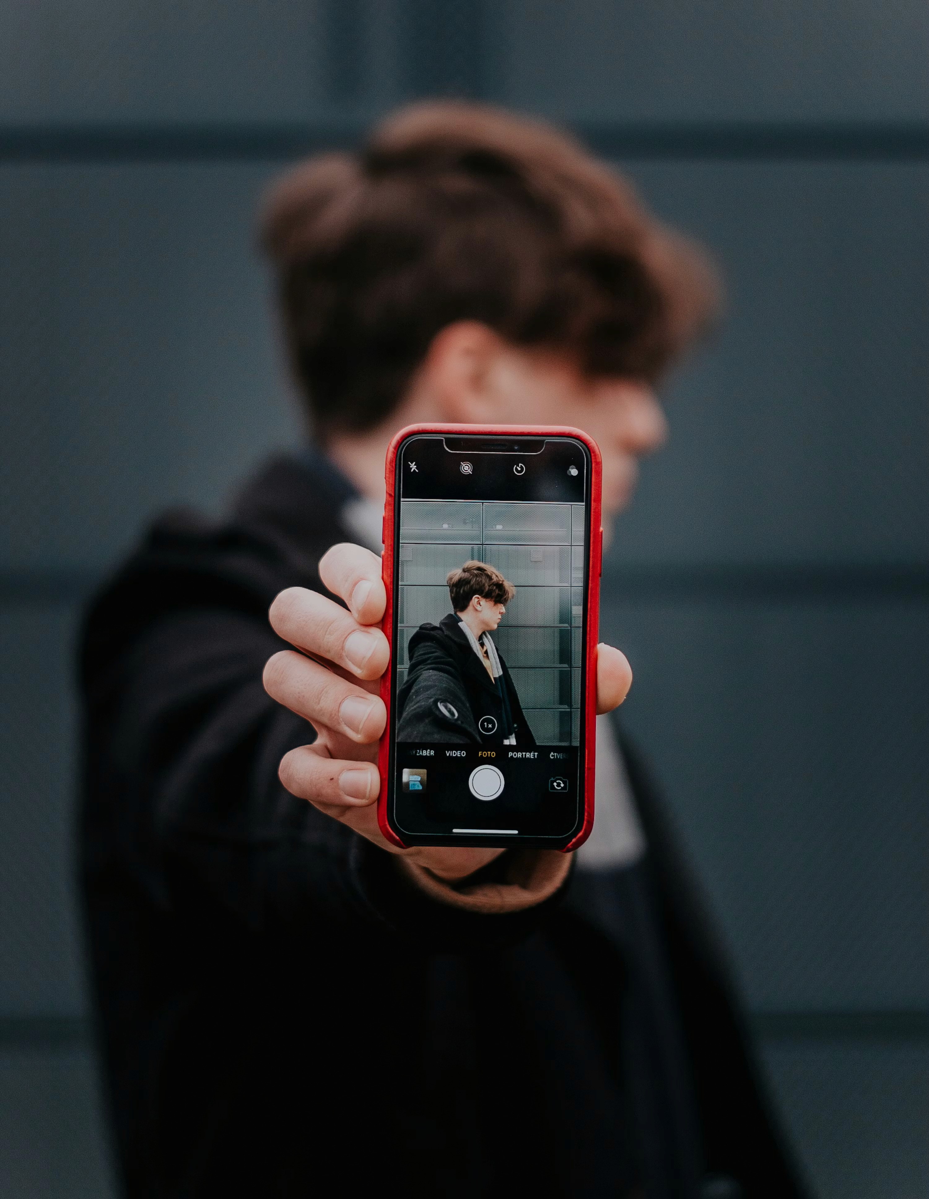 person recording himself