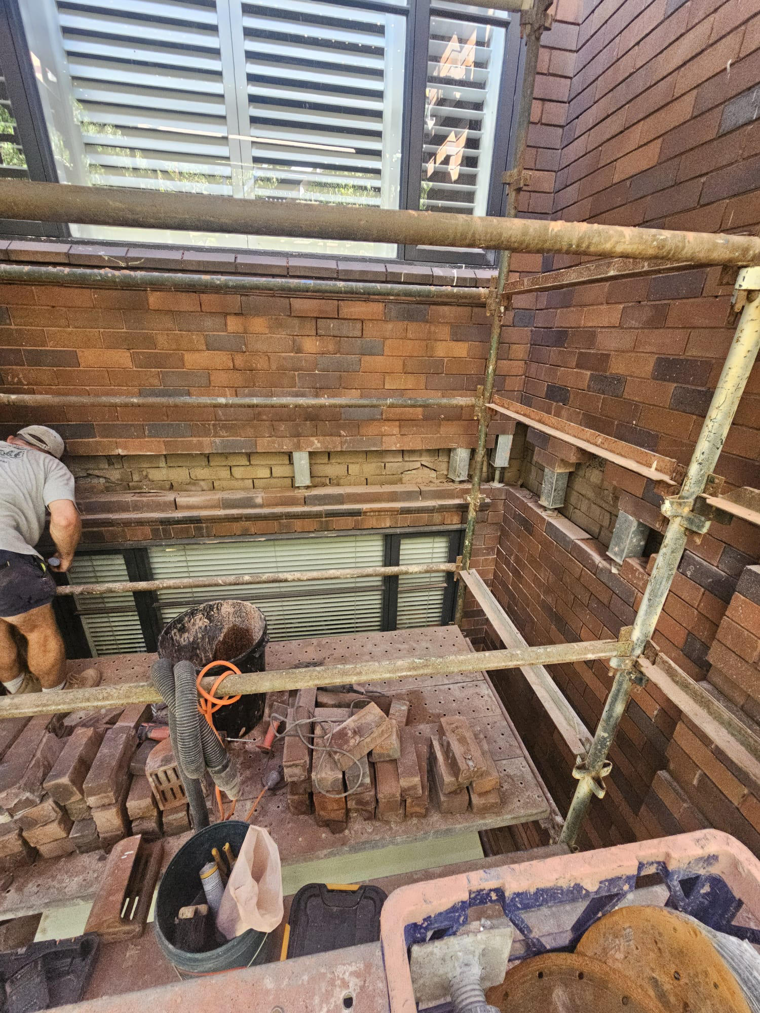 black and white cocnrete building low-angle photography