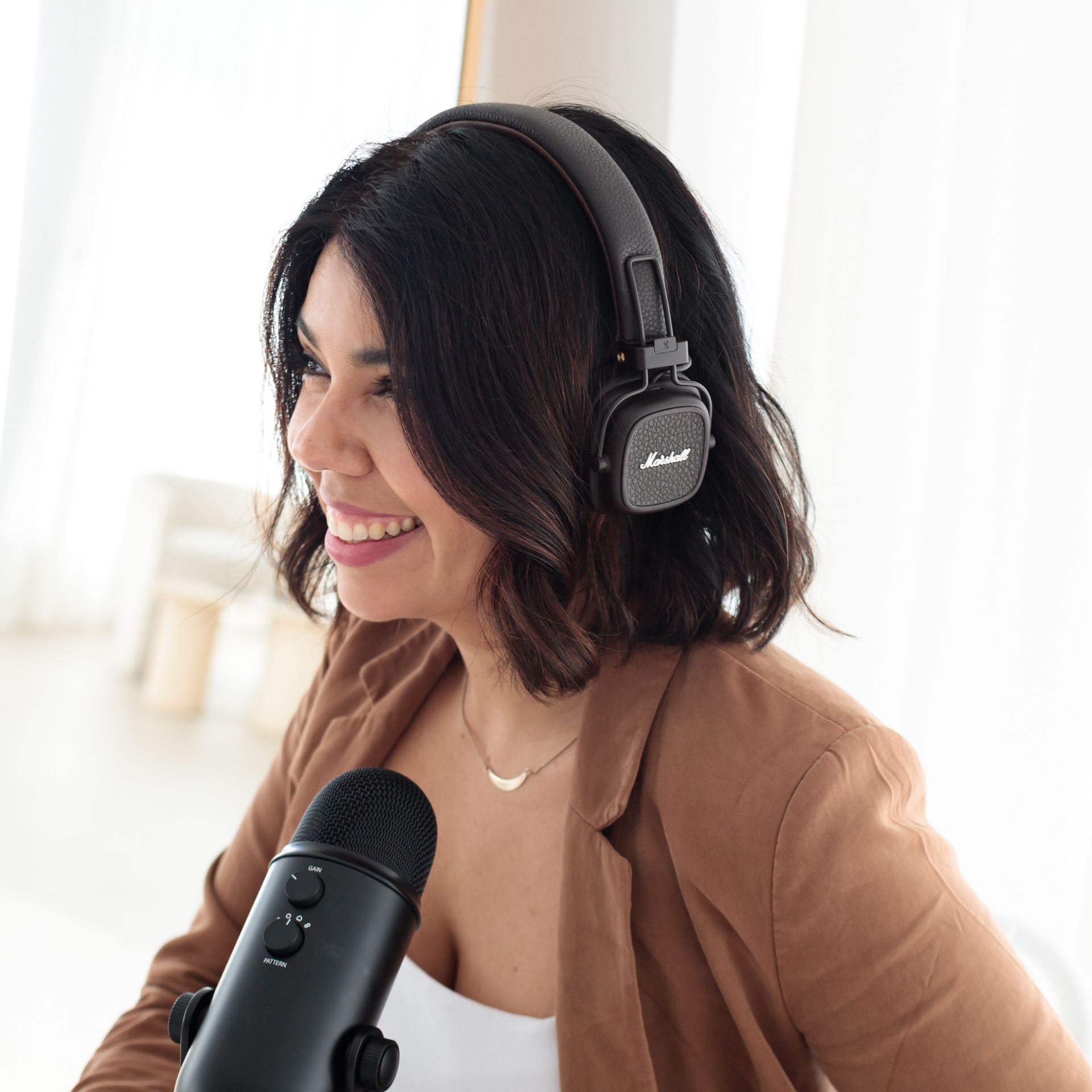 Patricia Ordoñez, Freelance Designer founder of Rara Design Studio reccording a podcast episode